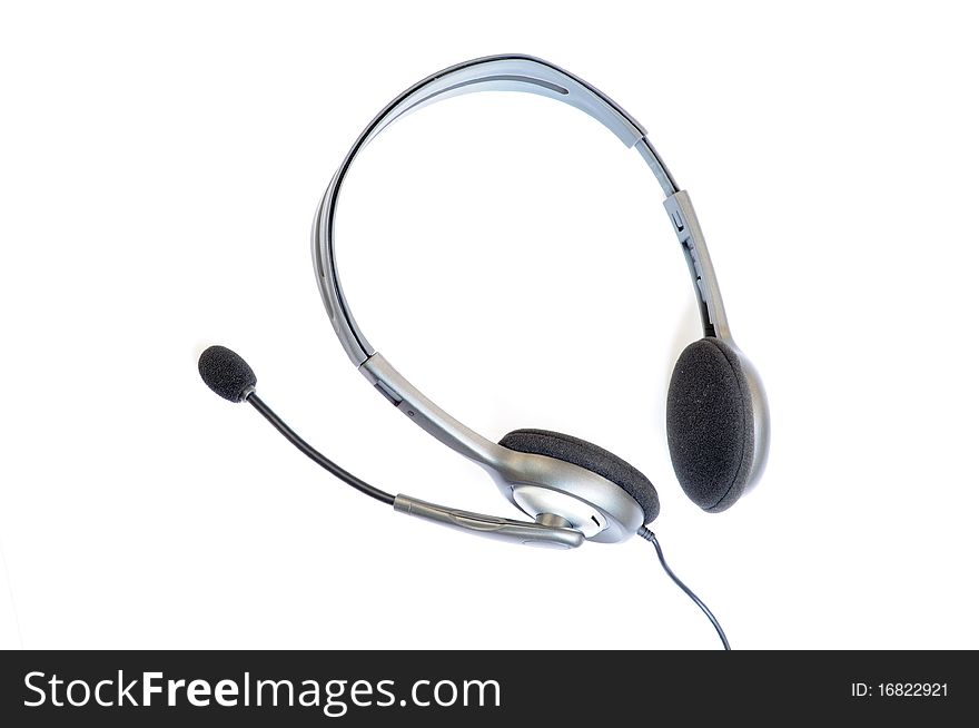 Black headphone with microphone isolated on a white background