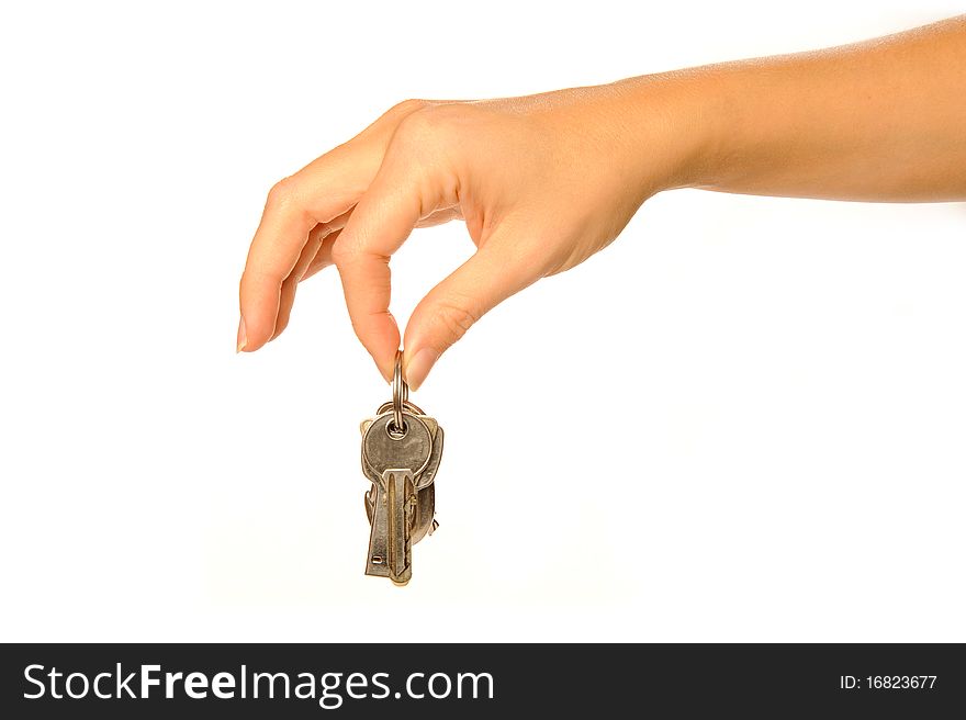 Human hand holding keys in palm