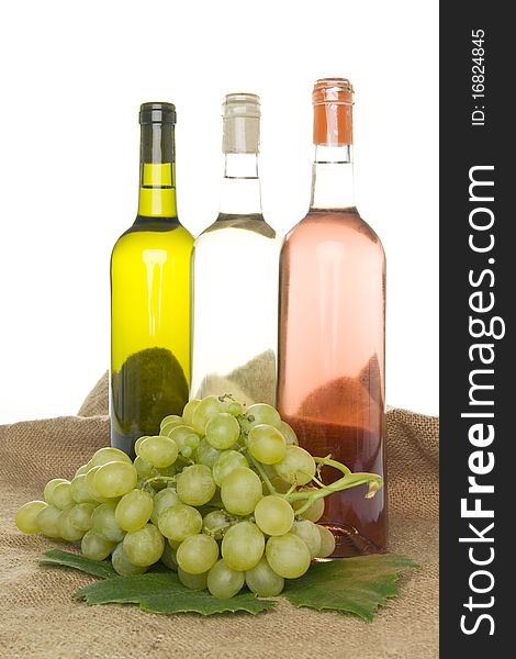 Wine and grapes, on white background. Wine and grapes, on white background.