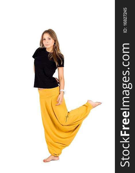Playful girl in yellow trousers