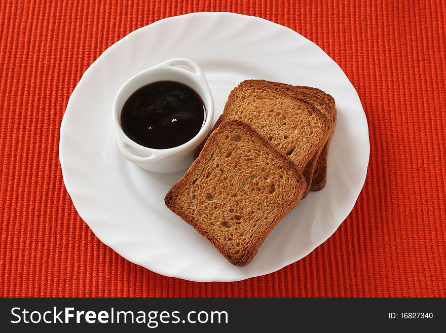 Toasts with jam on a plate