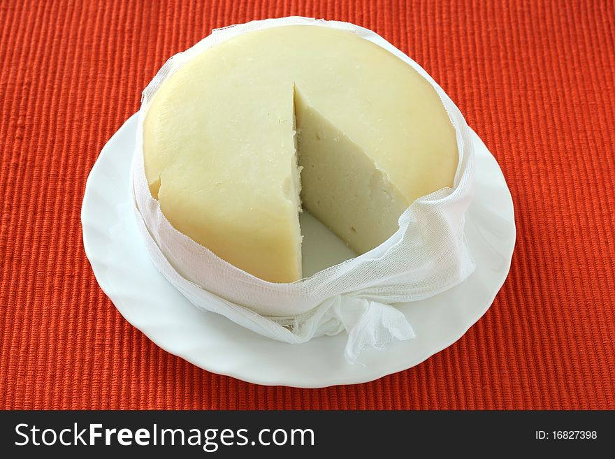 Cheese on an white plate. Cheese on an white plate