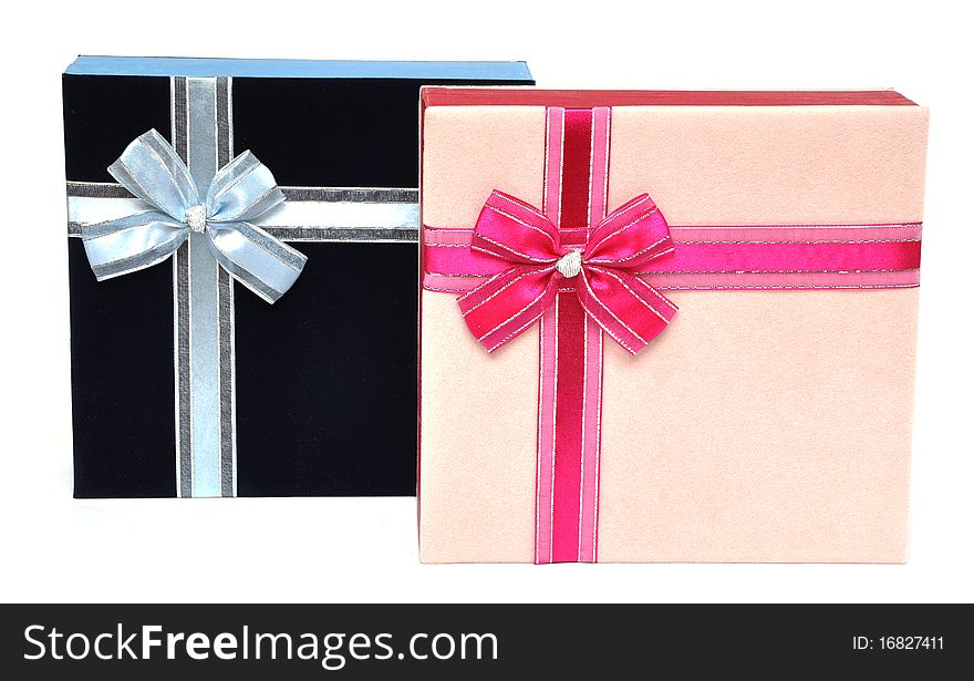 Gift boxes decorated with ribbon isolated on white background. Gift boxes decorated with ribbon isolated on white background.