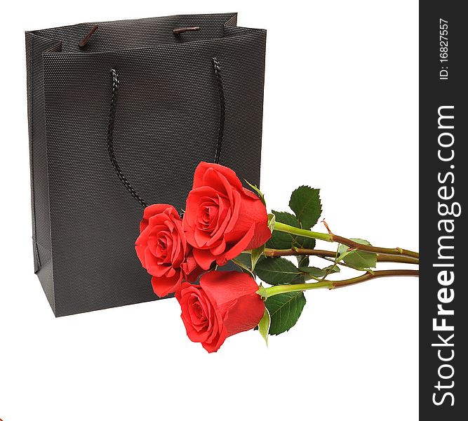 Black bag for a retail shopping experience with red rose. Black bag for a retail shopping experience with red rose
