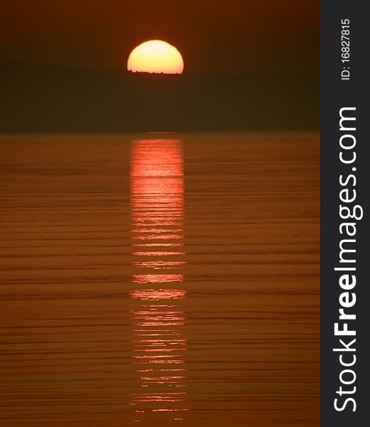 Sunset and ripples on sea