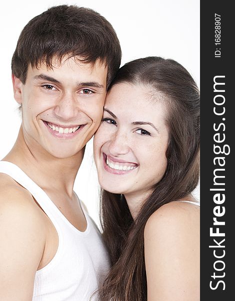 Portrait of a beautiful young happy smiling couple. Portrait of a beautiful young happy smiling couple