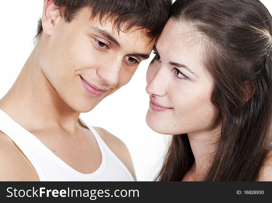 Portrait of a beautiful young happy smiling couple. Portrait of a beautiful young happy smiling couple