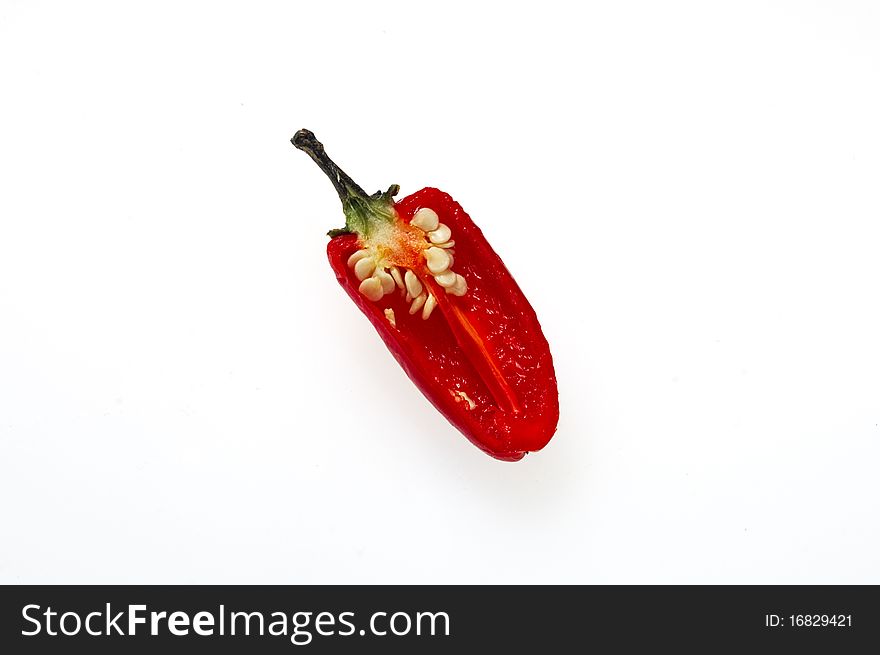 Cut Red Bullet Chilli - isolated on white. Cut Red Bullet Chilli - isolated on white