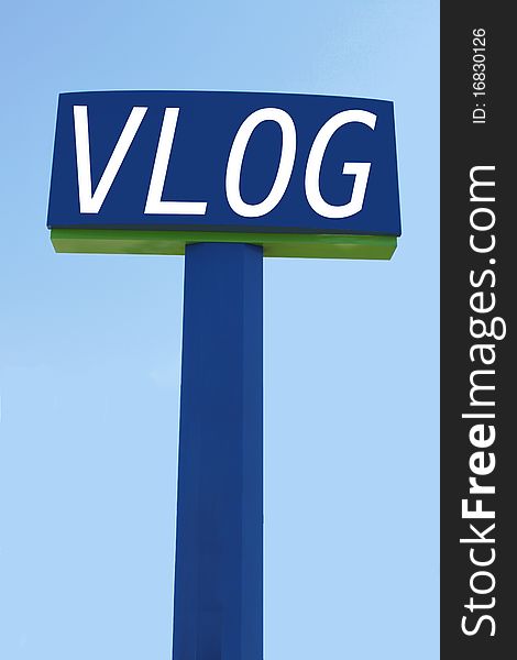 The word 'vlog' on a blue and green sign.