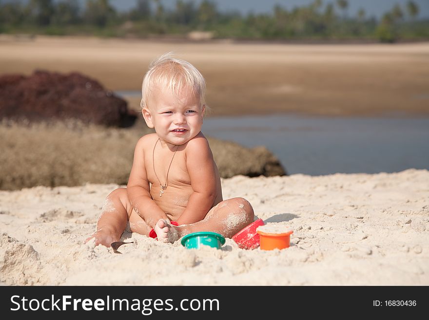 Portrait of 1-2 years boy playing on the beach. Portrait of 1-2 years boy playing on the beach