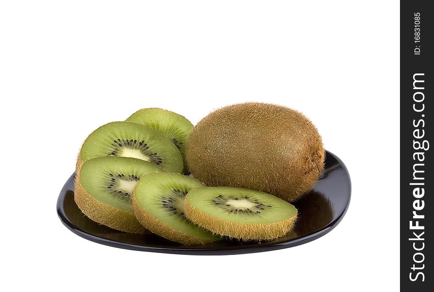 Beautiful fruit kiwi on a black plate