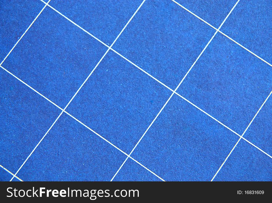 Paper abstract blue background with white crossed lines.