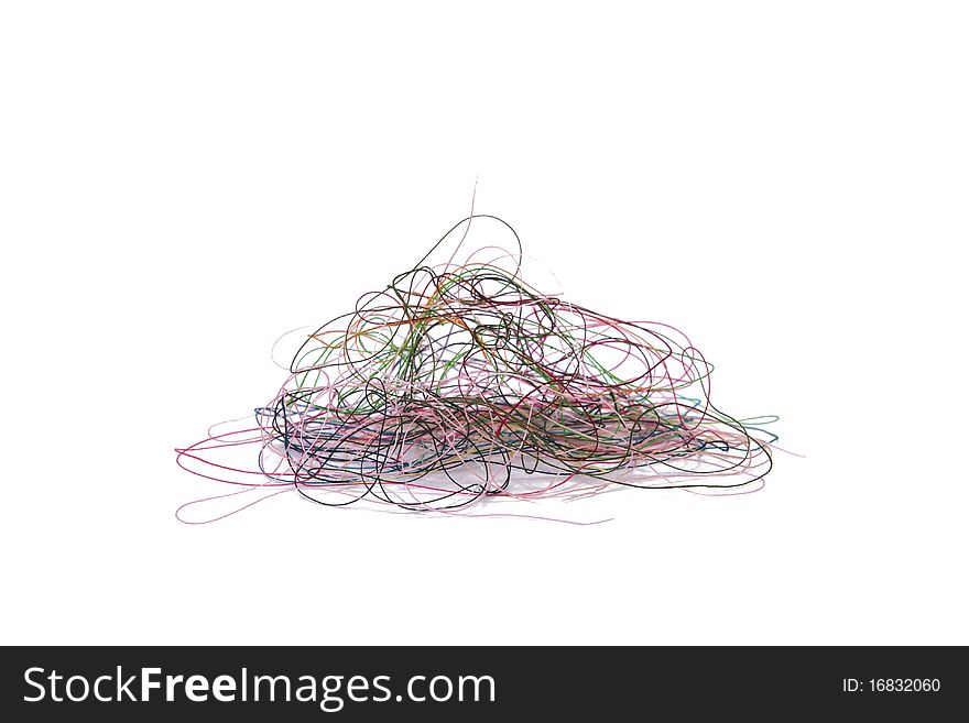 A Pile of Loose Thread on a White Background