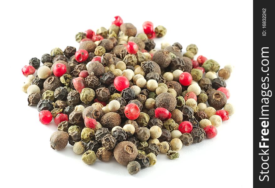 Closeup of mixed pepper isolated on white background.