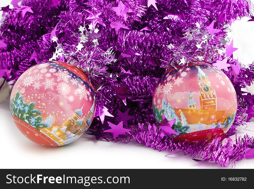 Christmas balls with fairy tale winter pictures in to a tinsel. Christmas balls with fairy tale winter pictures in to a tinsel.