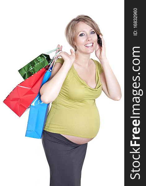 Young pregnant woman shopping while expecting baby