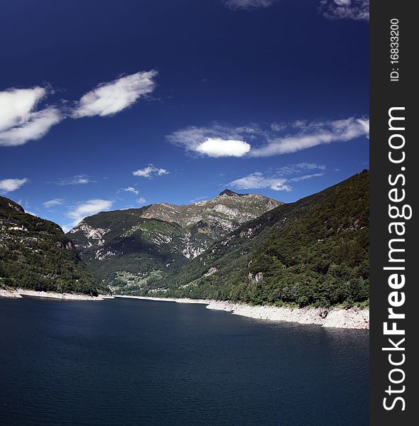 An artificial lake created in the mountains of Switzerland. An artificial lake created in the mountains of Switzerland