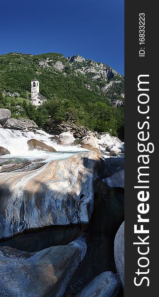 A river in the mountains of Switzerland, the Alps. A river in the mountains of Switzerland, the Alps