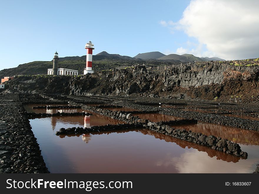 La Palma lighhouse as seen from the salt ponds nearby. La Palma lighhouse as seen from the salt ponds nearby.