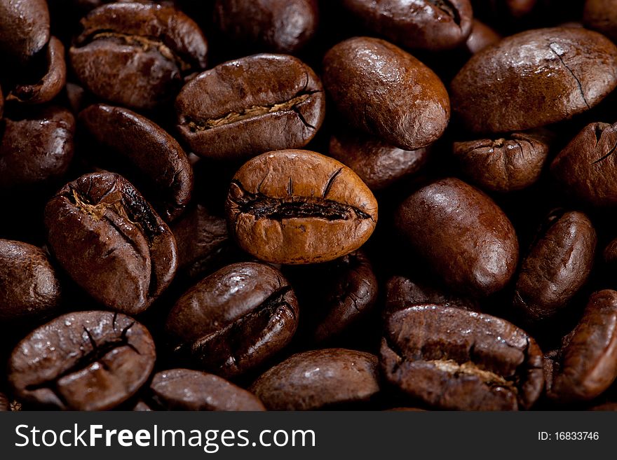 Close up view of some roasted coffee beans