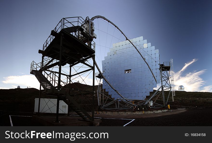 MAGIC Cherenkov telescope, one of the two, having an 17 m segmented mirror. MAGIC Cherenkov telescope, one of the two, having an 17 m segmented mirror