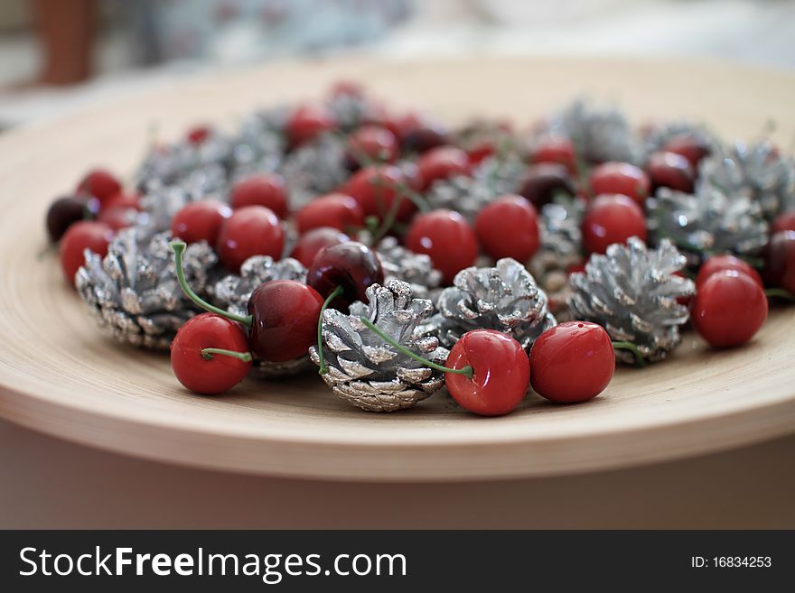 A christmas decoration with cheries. A christmas decoration with cheries