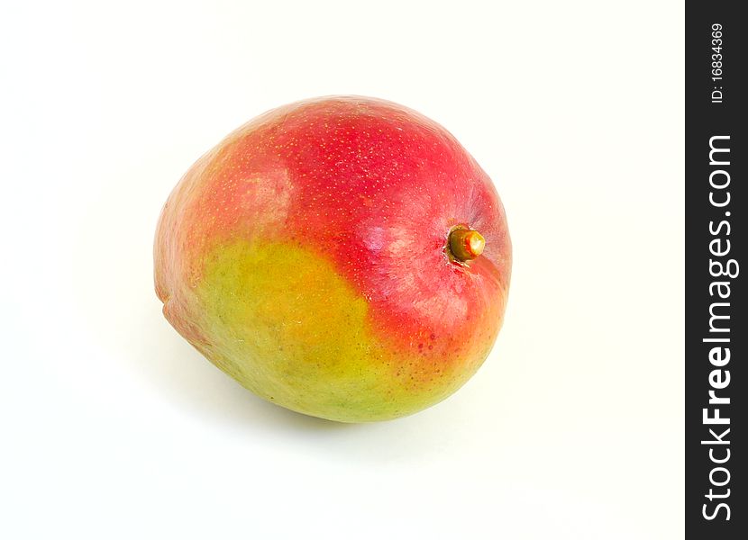 Ripe mango on white background