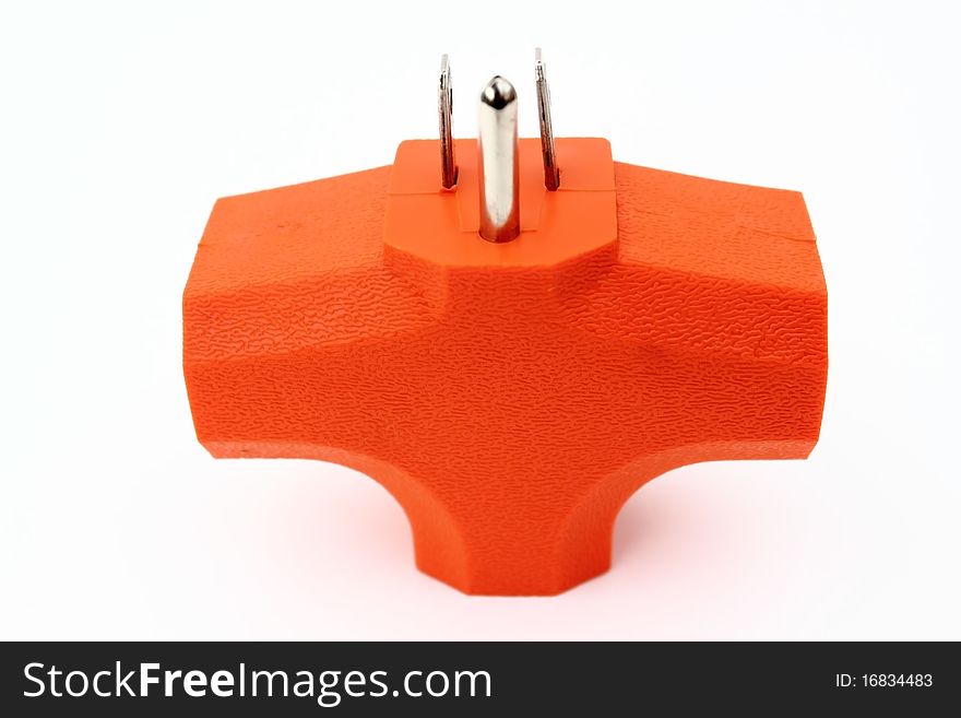 Orange 3 outlet grounded electrical plug adapter isolated on white background. Orange 3 outlet grounded electrical plug adapter isolated on white background