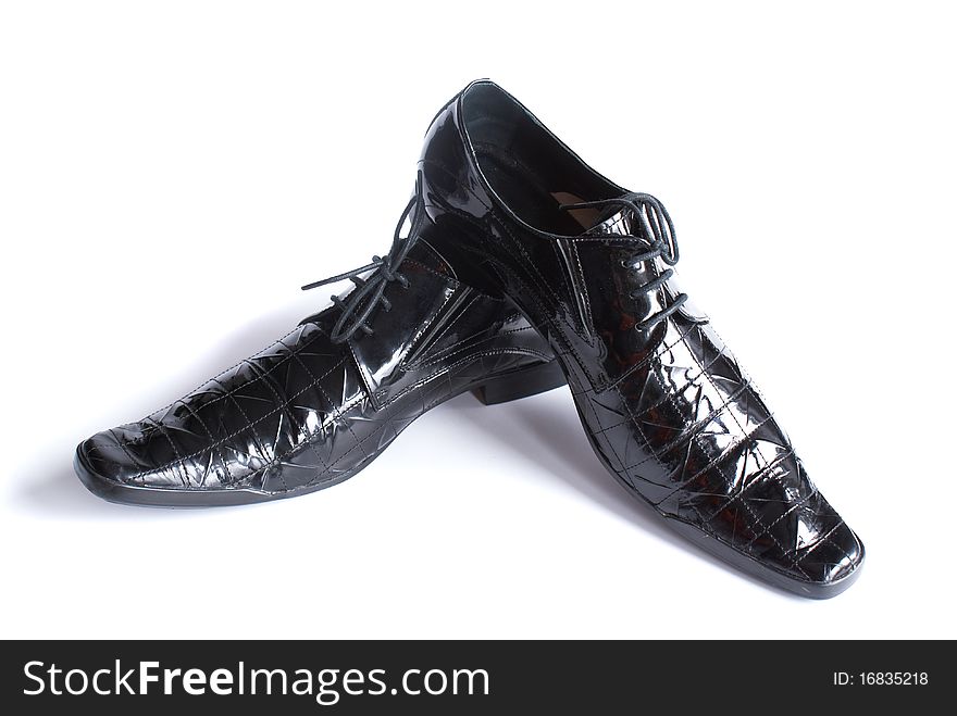 Man's modelling shoes isolated on a white background