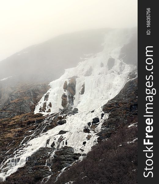 Frozen waterfall in highland of norway