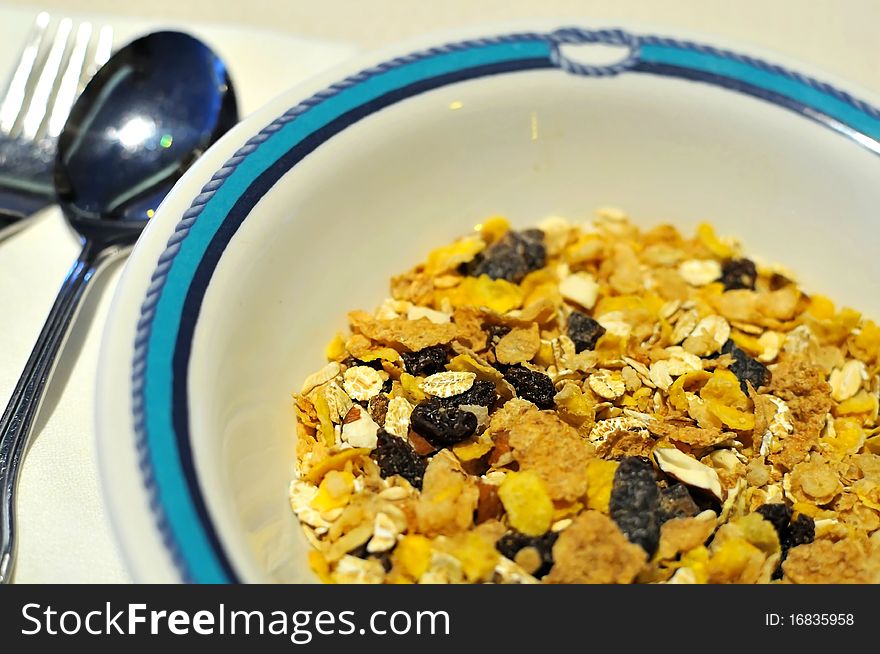 Healthy muesli or cereal topped with dried raisins. Normally eaten during breakfast. Healthy muesli or cereal topped with dried raisins. Normally eaten during breakfast.