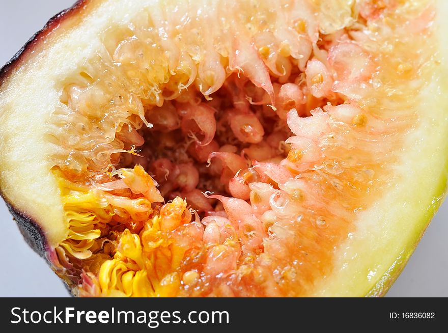Closeup of cut fig. For healthy lifestyle and fruit concepts. Closeup of cut fig. For healthy lifestyle and fruit concepts.