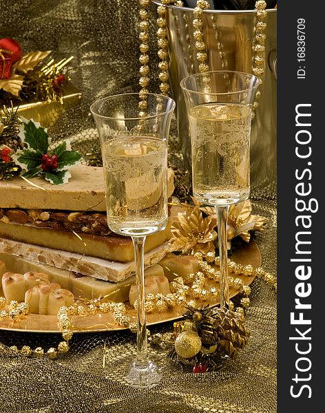 Typical Spanish Christmas nougat in a golden plate