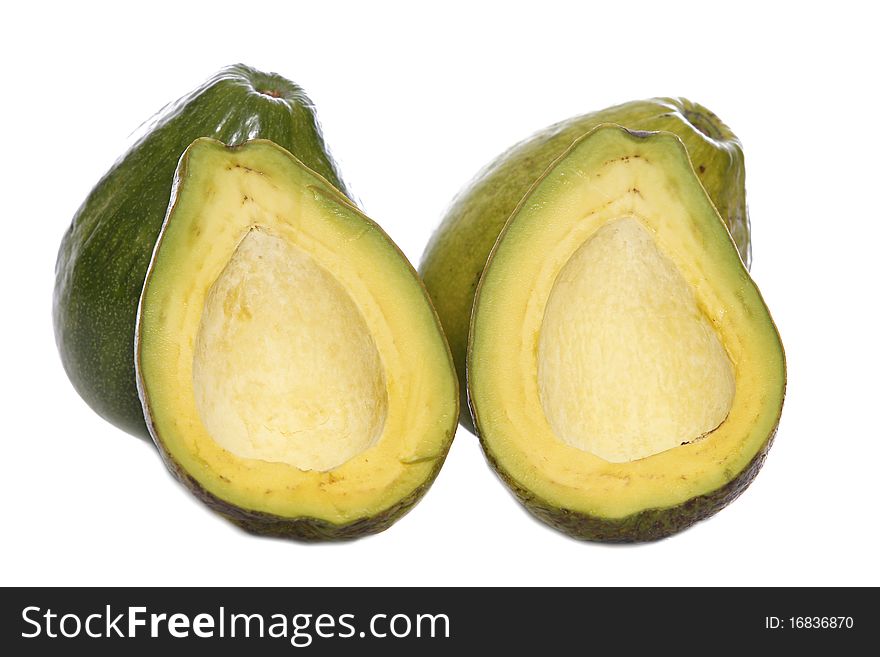 Whole and halves sweet avocados for dessert. Whole and halves sweet avocados for dessert.