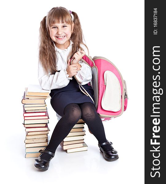 A Girl Is Sitting On The Books