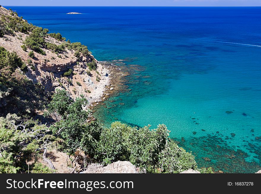 A view of the sea with rocky seaside. A view of the sea with rocky seaside