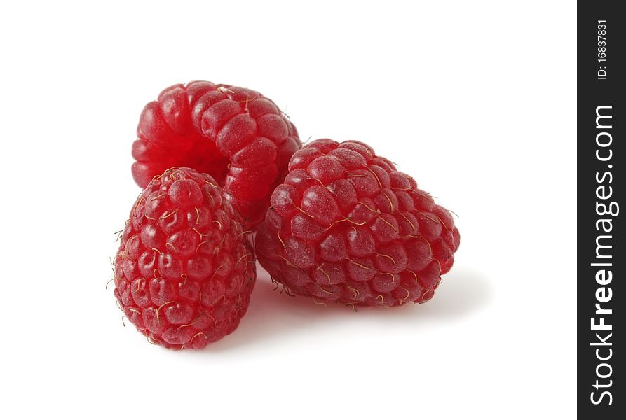 Ripe juicy raspberries on a white background. Ripe juicy raspberries on a white background