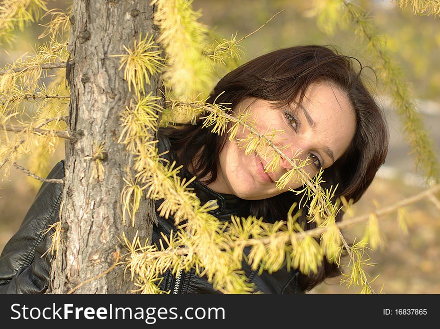 Girl in a coniferous forest