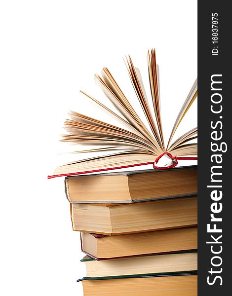 Pile of books on white background