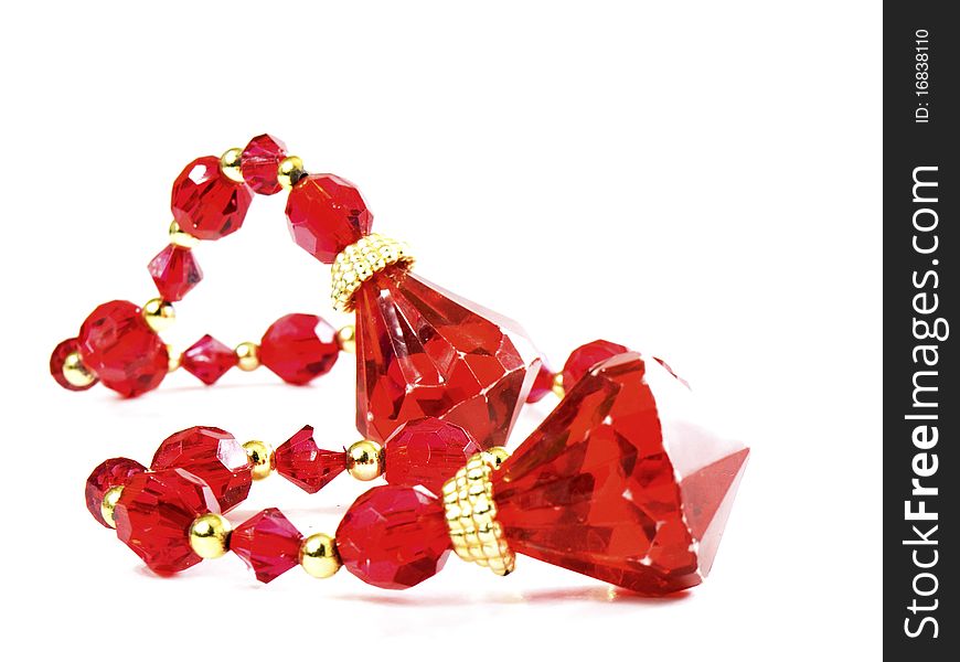 Red gems in a chain isolated on white background