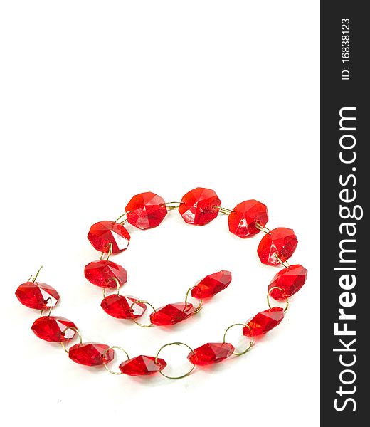 Red gems in a chain isolated on white background