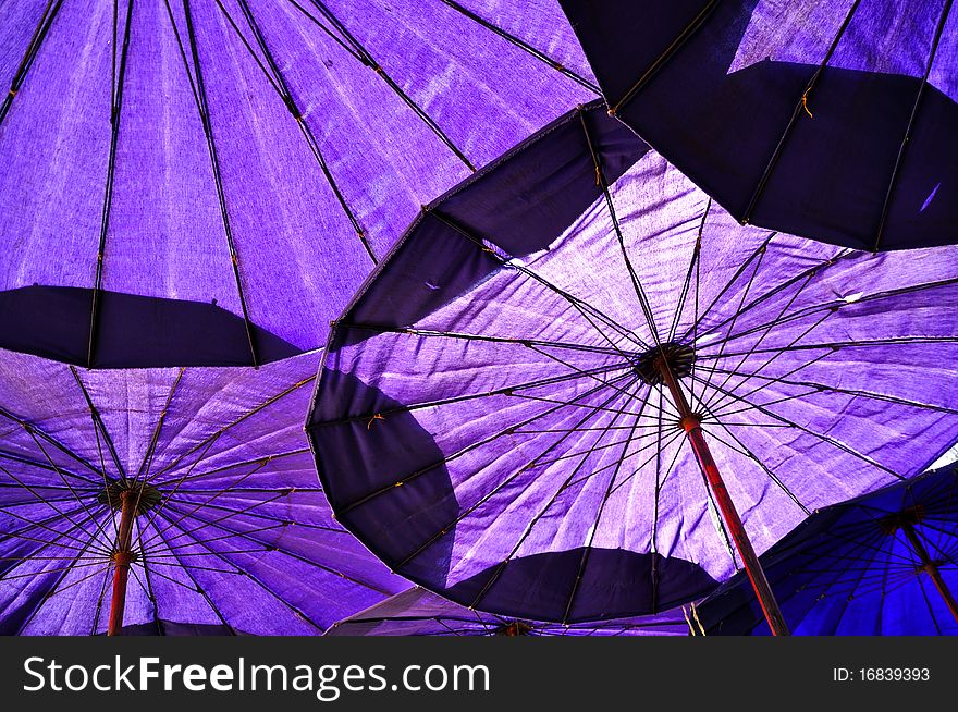 Under blue umbrella at Chaum beach, Thailand