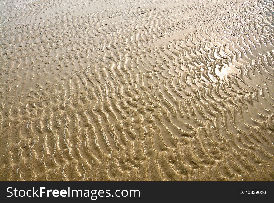 Reflex of sun in the sand pattern