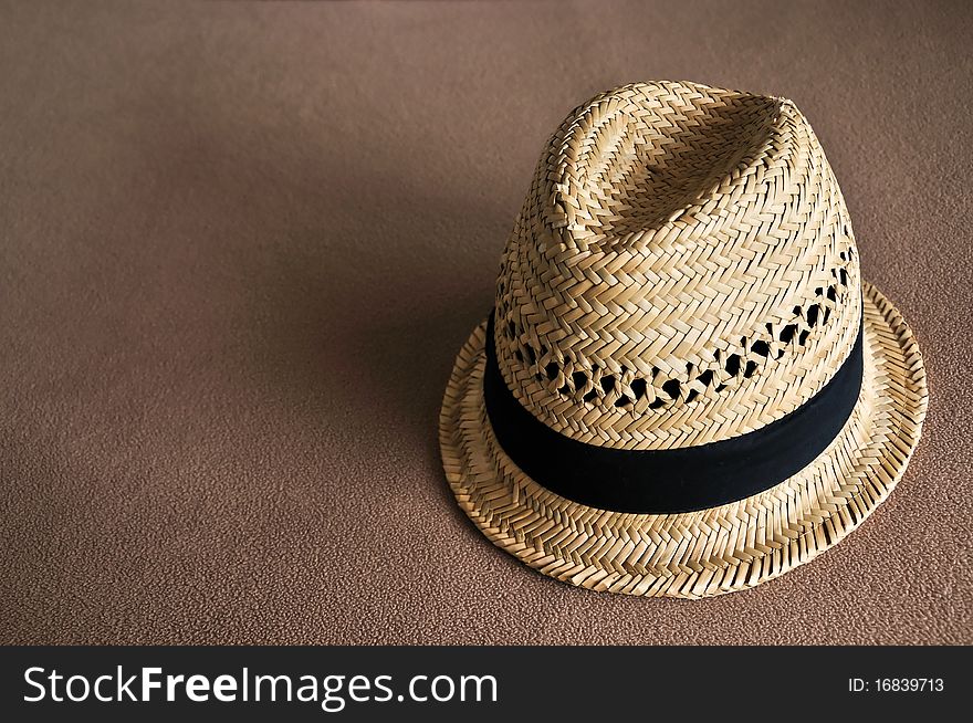 Beach Hat on brown background