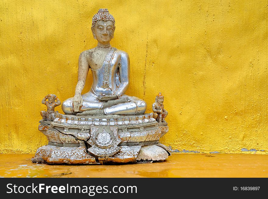 Image of Buddha with golden background