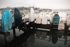 Row Boats Tied To Jetty Handrails. Royalty Free Stock Photo Row Boats Tied To Jetty Handrails. Royalty Free Stock Photo