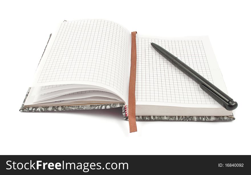 Diary with a pen on a white background