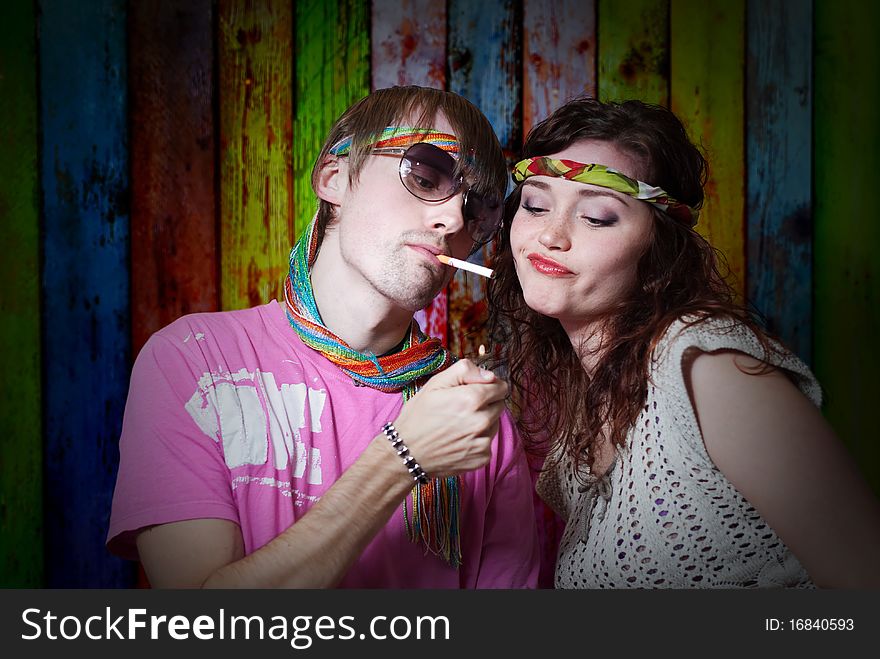 Young man and woman portrait in hippie style. Young man and woman portrait in hippie style