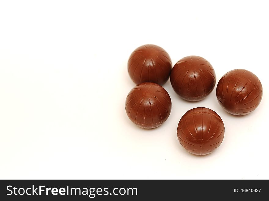 Chocolate sweets on white background. Chocolate sweets on white background