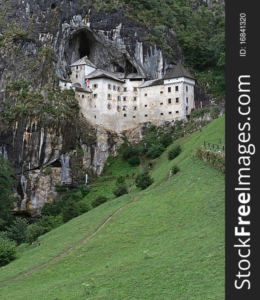 Predjama castle built within the cave mouth in southwestern Slovenia. Predjama castle built within the cave mouth in southwestern Slovenia.